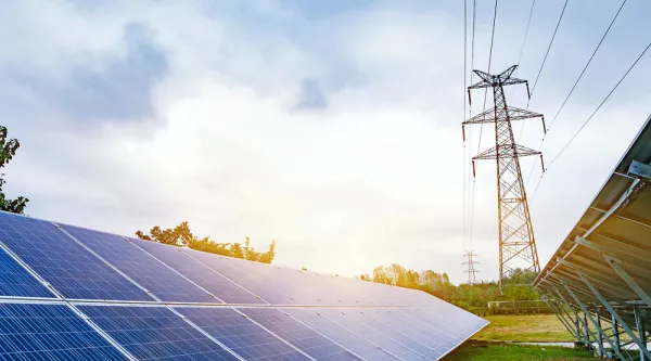 solar panels and electricity tower